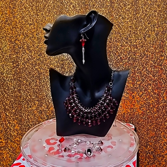 Jewelry - Cute red jewlery set. Includes earings, necklace, and bracelet.